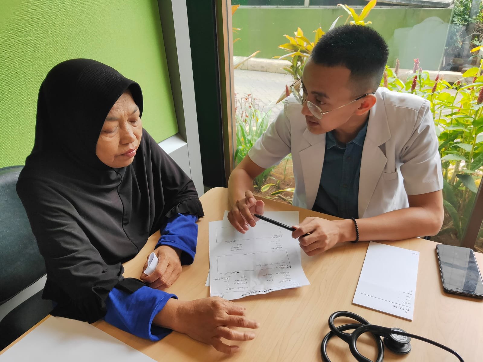 A healthcare consultation during a documented community activity.